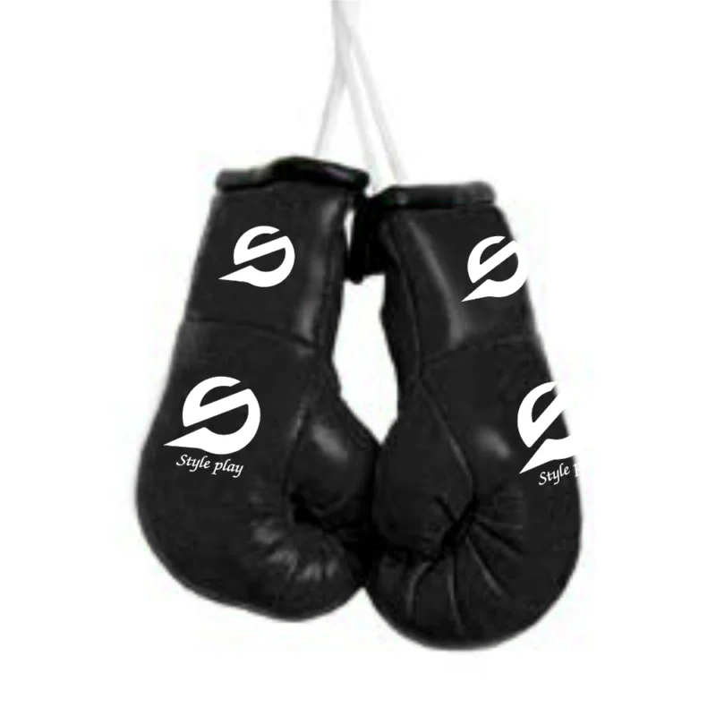 Realistic black mini boxing gloves used for car hanging decor keychains or sports-themed gifts with detailed stitching.