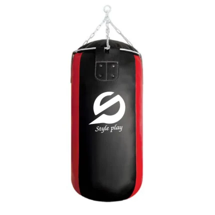 Punching bag filled for boxing and MMA training hanging in gym setup